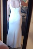 Dress fits perfectly! Great quality and very comfortable!! Bought the dress to wear for my wedding within the next year and wanted something simple and comfortable and the dress is everything that i wanted! - Mckenzie B.