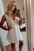 Needed a pretty white dress for grad photos and it looked great! The crochet at the top came undone in a few spots after washing so I just cut them off and it looked fine! - Lydia D.