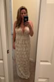 The dress was ok and def could have been worked with but I just didn't feel comfortable in it. It has A LOT of material, 3 layers. It is more beige than blush as the picture shows. It just was not too flattering on my shape. The layers of material made me appear wider than I am. In the pics you can see how I was going to alter it to be more fitted before deciding to return it. It is very long even with 3" heels as well so leave time for alterations. I also purchased the breast lift tape (not used in the pics) and that did help the top to be more flattering. Just not for me. - Sheri H.