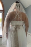 This dress is for my small intimate wedding this summer. Covid-19 postponed my 100+ person wedding/reception :( I needed another dress since I can't have alterations done on my original dress in time. The fabric of this dress is incredible! It's not see through, it flows nicely and doesn't show off any lumps or bumps. The dress will need hemmed since I'm only 5'1 and I will get it taken in a smidge around the bust too. I added a belt to the dress that I had bought previously. For $60-70, you can't beat this dress! I'm an older bride, 40 years old, and it is appropriate for both younger and older brides. Shipping was crazy fast too! Can't wait to wear it on my big day!!! Thanks Lulus for coming through for me! - Mary R.