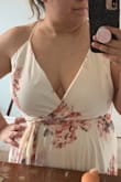 I ordered this dress for my Bridal Shower that was supposed to happen this year but due to COVID-19 my wedding and events surrounding it have been pushed to next year. 
I can't begin to tell you how beautiful I feel in this dress. It was everything I was expecting and more. However I did have to exchange for the next size up. I originally got a Large but it ended up being to small in the bust. I felt like I could probably get away with it but my girls were out to much and felt like it was just to much for a bridal shower. So I changed it for a XL and I was so happy! It comes with a snap which didn't stay closed while I was wearing it but I liked the style more without it being clipped. 
I high recommend this dress! It is worth every penny! If you are larger in the bust department I would recommend sizing up if you don't want the girls to pop out! But if not I believe this dress runs true to size! - Hilary F.