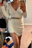 I love the fit of this romper. The long sleeves are super flattering, as is the skirt coming across the front. The fabric is thick and not see-through, with just enough stretch to move comfortably! Looks cute with or without a belt! Can't wait to wear it for a bridal shower! - Laura F.