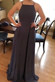 This dress is a gorgeous color and the strings in the back are very easy to tighten and loosen with another persons help. I love it so much!! - Rylie D.