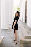 Loved the style of this dress! It was perfect for grad photos! Simple but has some fun elements with the ruffles on the bottom and sleeves. The dress is slightly short - I am almost 5'7" and had to be conscious of when I bent over. Overall, pretty great for its price! - Virginia M.