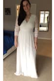 Ordered this dress as one of three I wanted to try on at home for my elopement next month. This one is for sure my winner! It is just absolutely beautiful. I am posting pictures of it as is. I am going to get it altered, but you can't beat the price. I love all the details, I am going to see if I can get the V a little deeper and maybe cap or do 3/4 sleeves. The sleeves are loose, so if I keep the sleeves, I will at least make them very tight to my arms. I LOVE this dress, it looks so much better on once you try it on than it does in the photos. Also, it is VERY long, I am 5'10" and will likely take off several inches. THE BACK is just TO DIE FOR. I have the sleeves shoved up my arms in the picture I am posting bc I think I want to shorten them to 3/4. If I wasn't planning on getting it altered, I would honestly be contemplating a medium rather than keeping the large. - Shelley C.