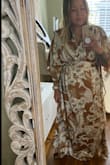 This dress is beautiful! From the color, material and comfort, you need to get it! It does run a bit large. Thankfully, from the previous reviews I did get a M. I love how flown and flattering this dress is. Love the neutral color of the dress/print as well! - Janelle P.