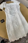The dress was nice.  I'm 5'9 and needed the medium for the length but the sides and open back were too loose. - Gina H.
