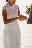 I had no idea where to find my wedding dress, then with the covid-19 everything was shut down. 
I was skeptical at first but it was my only option. It fit just perfect, it is of good quality and so affordable!! It has some pink but it looks elegant and modest. I couldn't asked for something better. - Rossy R.