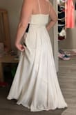 This is a beautiful dress, but I wasn't in love with it. There isn't any support at all if you have a large chest. A strapless bra can be worn with it, but it will show on the bottom of the chest and would need to be pinned. It was also way too long and I didn't have time to have it hemmed. - Jessica R.