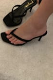 It's a little bit loose on me. Haven't had a chance to wear it out but try it on and it feels comfortable. Perfect height of the heels to work around without hurting ur ankle. Recommended - Hong L.