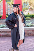 Love this dress! However it is tight when you sit down. It fits great walking around and standing. - Bayee C.