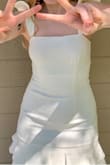 It fits perfectly!! I'm in love with this dress - Rayanna O.