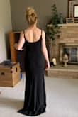 I received the Infinite Glory dress instead of the Melora, but the only difference is that the straps are thinner and the back is scooped instead of a V shape. I loved the dress enough to keep it, however! I usually wear a small, but I'm glad I went down a size like most of the other reviews suggested. FITS LIKE A DREAM. - Samantha N.