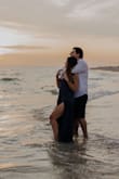 The dress is great material, it has some weight to it but it flowed beautifully on the beach for our engagement photo session. Very figure flattering and the slit is perfect. - Erin S.