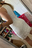 This is the first time that I ordered a clothing item online so I was really nervous, especially a dress because all dresses fit me differently. This dress was so amazing. It fit very well. I decided to order an extra small and a small just in case. I chose the extra small and returned the other size FOR FREE! It arrived sooner than expected which was great as well. If you are in between two sizes, I suggest ordering the smaller one or doing what I did because this dress is a little big on the chest area but I can't blame it because I have small boobs. - McKala S.