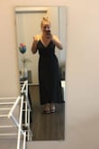 The fit was great and crazy flattering. I loved that I could adjust the slit by just changing how tightly I wrapped the dress. Super comfortable even after wearing for hours. Only a couple of issues for me (being a bit busty...): 1. Tightening the straps didn't have the effect I wanted (making it a little less low cut) because they just loosened right away (and kind of crookedly), but it still looked good overall. 2. Needing to find a strapless bra that was supportive enough for the neckline to look okay- but I eventually did! And since the back doesn't have a crazy opening/keyhole, I could make a regular strapless work, which is great for support. - Madison M.