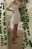 I bought this for my commencement (which isn't really happening anymore haha) but I LOVE IT. It fits PERFECT and is soooo flattering. I was nervous that it wouldn't fit my boobs, but the front part is adjustable so it's literally perfect. Totally worth the price and it's really good quality too:). - Nicole K.