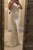 I found this very cheap dress to do a bridal photo shoot because I couldn't have a wedding party but still got married. The fabric is nice and thick, when I took this picture I was wearing a very dark color bottom underwear and you can't really see it. It's beautiful, simple and perfect.
PS. It looks a little long on me even with very high heels but I'm very short - Gabriela H.