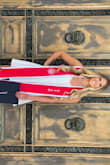 I bought this dress because I was looking for a white dress to use for my college graduation photos. I bought a size medium and it was true to size and fit nicely. A little big in the chest but I have small boobs. - Sydney M.