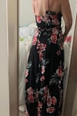 This dress fits in all the right places and is so pretty! I'm 5'5" so with some heels this dress length was perfect. This is a "wrap" style dress go it has strings you can use to tighten or loosen the shape of the dress around the waist. I was able to wrap it around my waist twice to tie in the back, but you can tie a bow to either side. Also, no bra needed, between the V in the front and my ability to tighten the waist everything was secure and looked good. Wore this to a wedding. - Caitlin M.