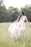 I loved this dress, was perfect for engagement photos and rehearsal dinner! I had to make some edits to the bust as the snap was positioned for someone with a smaller chest. Feels high quality and is long enough for wearing with heels! - Jen C.