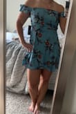 This dress is super cute the only downside I found was that there was a little more extra space than anticipated in the bust. Not very surprising since I'm kind of flat chested. Overall the fit and length were great. The arm bands weren't overly tight but in my opinion they didn't look great on me so I actually tucked them in by my armpits and made it into a strapless and liked it even better. - Caitlin M.