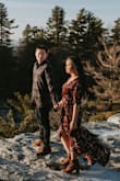 I wore this for my outdoor winter engagement shoot and the flowy skirt was perfect for blowing in the wind for photos. Love the length of the sleeves and light material. Since I'm 5'1", the skirt dragged a little behind me although I did wear heeled boots. I had to safety pin the front so I wouldn't fall out. Usually go back & forth between a Small/Medium, so this Medium was just a tiny bit loose. - Stacy I.