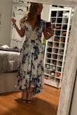 I absolutely love this high-low dress! The style is perfect for so many occasions, very classy! I plan to wear it for my engagement photos on the beach in two weeks! I can't wait to twirl around and capture a few photos of the flowy skirt! 

I ordered a small; however, I just placed a second order for an xsmall because the top was a bit too loose on my chest. Fingers crossed it fits otherwise I will definitely get the small taken in. - Jamie G.