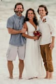 It's a beautiful dress, well-made and fits good. I just have to hem it up because I'm short. I also had the slit change to flow a bit better. I wore it for my beach wedding - Nikki G.