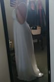 The quality of the dress was better than I had expected. Very happy with the dress. I am going to tailor it to suit me personally for a wedding dress! 
I followed the size chart and the dress fit nicely. I wanted some room for alterations, so I ordered a size up as well. - Ashley C.