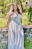 Decided to push up my wedding and have a very small ceremony in a park in. I ordered this dress and another and decided on this one because it's so beautiful! It actually looks a lot like a few wedding gowns I had saved for wedding inspo. It's super comfy and flowy! I had to have the front hemmed ever so slightly, I did wear wedges with a small heel. I have bigger boobs and they were a little squished but it's to be expected. This dress is low cut has no support because of the extremely flimsy and thin straps but if you find a good strapless bra it'll work for busty gals! I love this dress so much I felt so beautiful and confident in it. - Kelsey F.