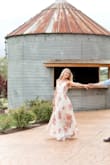 I wore this dress for my engagement photos and couldn't have picked anything better. It was so well made, fits true to size and the tie at the waist was so flattering. Definitely recommend! - Caitlin L.