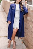 I wanted a dress that was a bit form-fitting but not overly form-fitting like an actual body con dress and this one was PERFECT! It fits great and is very comfortable. You will need a strapless nude bra though. I loved it! The length was appropriate, even with heels on! - Sarah B.