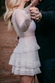 This is by far one of my favorite dresses I've owned! I bought this for engagement photos although I'm hesitant to order online so I was very surprised with the perfect fit! Arms are a bit snug just because they don't stretch and is difficult to lift arms without the whole dress coming up. - Christine R.