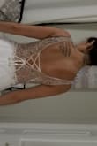 I wanted this dress for awhile for my wedding. It is so beautiful. The beadwork and feel of the dress makes it look like it's much more expensive than what you're paying. I wish they had a smaller size than 2, but it's okay I'll do alterations for it. My wedding is in December,  and I try on this dress every time I get a chance to. - Marlena