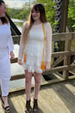 Got this dress for my daughter's graduation, to be worn under a white gown. It is so cute!! I was worried that it would be too short, but I think the model's long legs make it look shorter than it is. It's above the knee but not dangerously short. The fit is excellent, and I'm really impressed with the construction. I've washed it twice in a lingerie bag on the permanent press setting of my washer, in cold water, and hung dry. It came out perfectly. A great purchase! - Rebecca H.