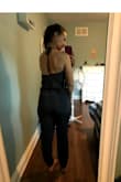 This is great!! I have a smaller top half and bigger bottom half so finding rompers that fit is a challenge. Not anymore! The material is lighter then I was expecting, a little thing but breathable with some stretch. The adjustable halter is great with the low neck line. I normally safety pin the front with this style however there is enough fabric in the overlap that a safety pin is not required.. so happy!! My only issue is with the length, it's a bit long for me. The ankles are bit baggy but the elastic is helpful, might just tuck it under next time. Overall this romper fits and feels great!! - Sarah N.