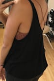 This tank is perfect! It's flowy but hangs just right and doesn't make me look boxy or like I'm drowning in it. I love the length of it too! - Carmy L.