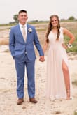 I wore this to prom and received so many compliments! I had to hem the bottom and close the top part so my bra wouldn't show. It fit perfectly after that and I loved it! - Brighton G.