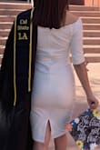 I loved this dress! I wore it to take graduation pictures and everyone loved it. The material is thick and not flimsy, although it does get loose after wearing for a while. - Jasmine R.