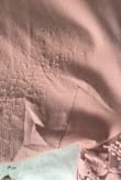 I own 3 of these tops and I absolutely love them. I have encountered a small problem with the pink one as the material where the embroidery is rubs off the fabric and makes it look very worn out. - Anita C.