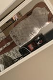 I bought this for my bridal shower in August! It is a little tight but if I would of sized up or down, it wouldn't of worked! This is definitely something you'd have to wear a no show thong with or nothing at all because it does hug my hips some! I totally recommend I bought in blue as well! - Danielle B.