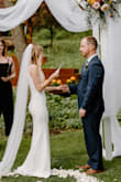 Our original wedding had to be postponed due to COVID. We decided to have a small backyard wedding ceremony on our original date with just family. I didn't want to wear my original wedding dress for our backyard wedding, due to wanting to save if for our "big" wedding. This dress fit absolutely perfect and was the perfect dress for our backyard wedding! The dress was a little long, but once I put on some heels, the length was just right!  Couldn't have been more happy with this purchase! - Jenna F.