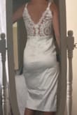 I am obsessed with this dress! I bought it as my reception dress if I decide to take off my wedding dress and it's perfect. It's a tiny bit big around the waist but I would not change for a different size, just maybe take it in a little. The satin is beautiful, I was afraid it might look like a nighty, but it is so professionally made it doesn't look like that at all. In these pictures it is super wrinkly but obviously that can be fixed! - Melissa B.