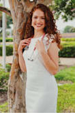 I used this dress for my graduation pictures. It is true to size and of good quality. - Patricia H.