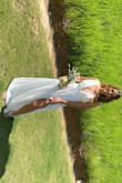 The dress is absolutely perfect, just a little too long but I really didn't care much about it. I wore for my wedding at the mountain and I loved it! - Maria L.