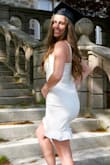 This dress was exactly what I was looking for with my graduation pictures. The white wasn't see through at all and is a great material. I would say it runs a little big, so I would size down if you want it tighter/shorter. - Cathy P.