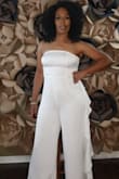 I am about a size 6, so I wanted to make sure my jumpsuit had a little flow with it. I ordered a size medium. It was a statement maker for my quarantine home photoshoot. I literally have nearly 3K likes and views on social media. Best of all, I took home a celebrity contest win! Look out Angela Bassett! - Danyel H.
