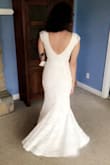 This dress is everything!! I wasn't sure if I'd like this style on me but it hugs all the curves and surprisingly looks good in the bust without any support! The nude underlay helps the lace really stand out which I love. The cap sleeves fit perfect and the back looks amazing too. I couldn't be happier and cannot wait to wear this for my wedding. - Michelle G.