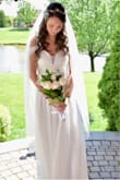 My original (expensive) wedding gown couldn't be altered for my May 30, 2020 wedding, so I found this bridal beauty! Simplistic and totally different than my costly, embellished dress, but I love it just the same! So feminine and lightweight, the material flowed and was comfortable all day. I usually wear a juniors size SMALL or 5/6, but I tried an XS thinking it was roomier than a straight skirt. It fit well in the waist but was too tight in the bust and ribcage (however I am slightly broader across the back). The SMALL fit perfectly above the waist and was only an inch too big at the waist, which I had taken in by a friend and hemmed 2-1/4" to wear with 3" heels. Everyone loved it! - Jennifer F.